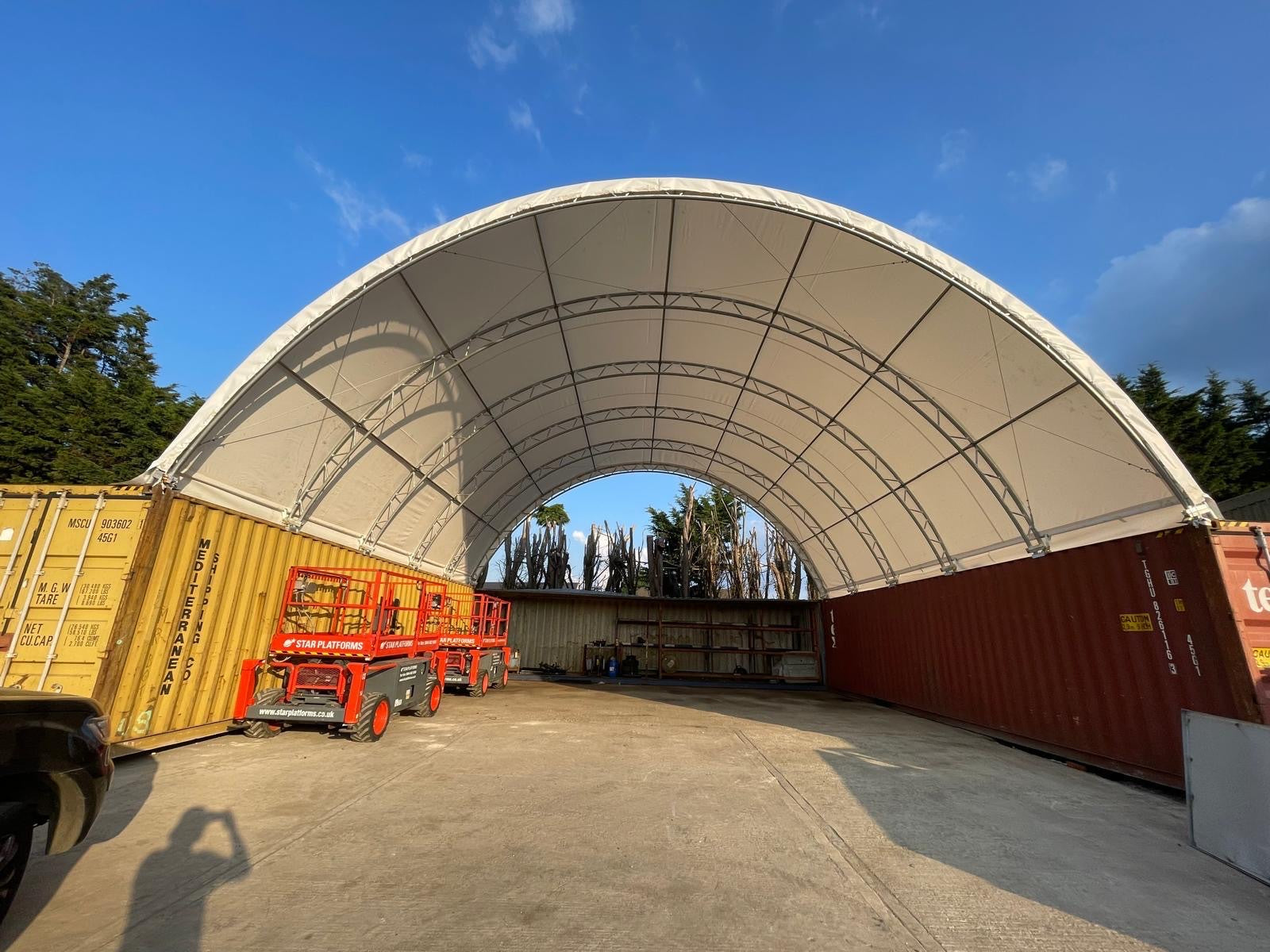 infornt of an Open Back Panel Container Canopy