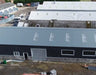 Weather-Resistant Insulated Steel Building: Designed to withstand harsh conditions with insulation for added comfort.